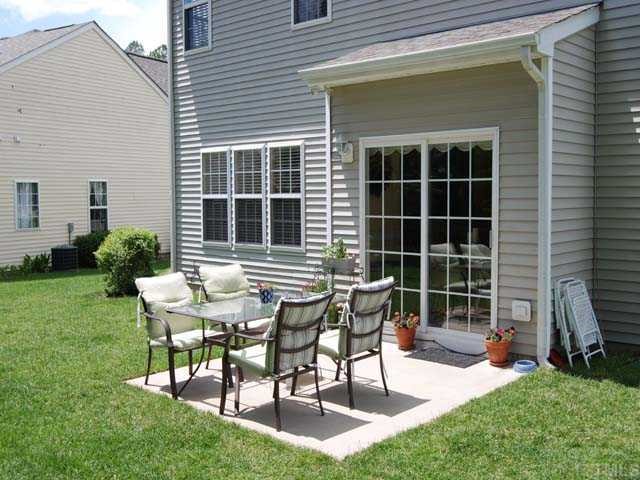 5608 Enoree Lane Raleigh, NC 27616 - Photo 10 of 12 Terrific patio overlooking wooded backyard