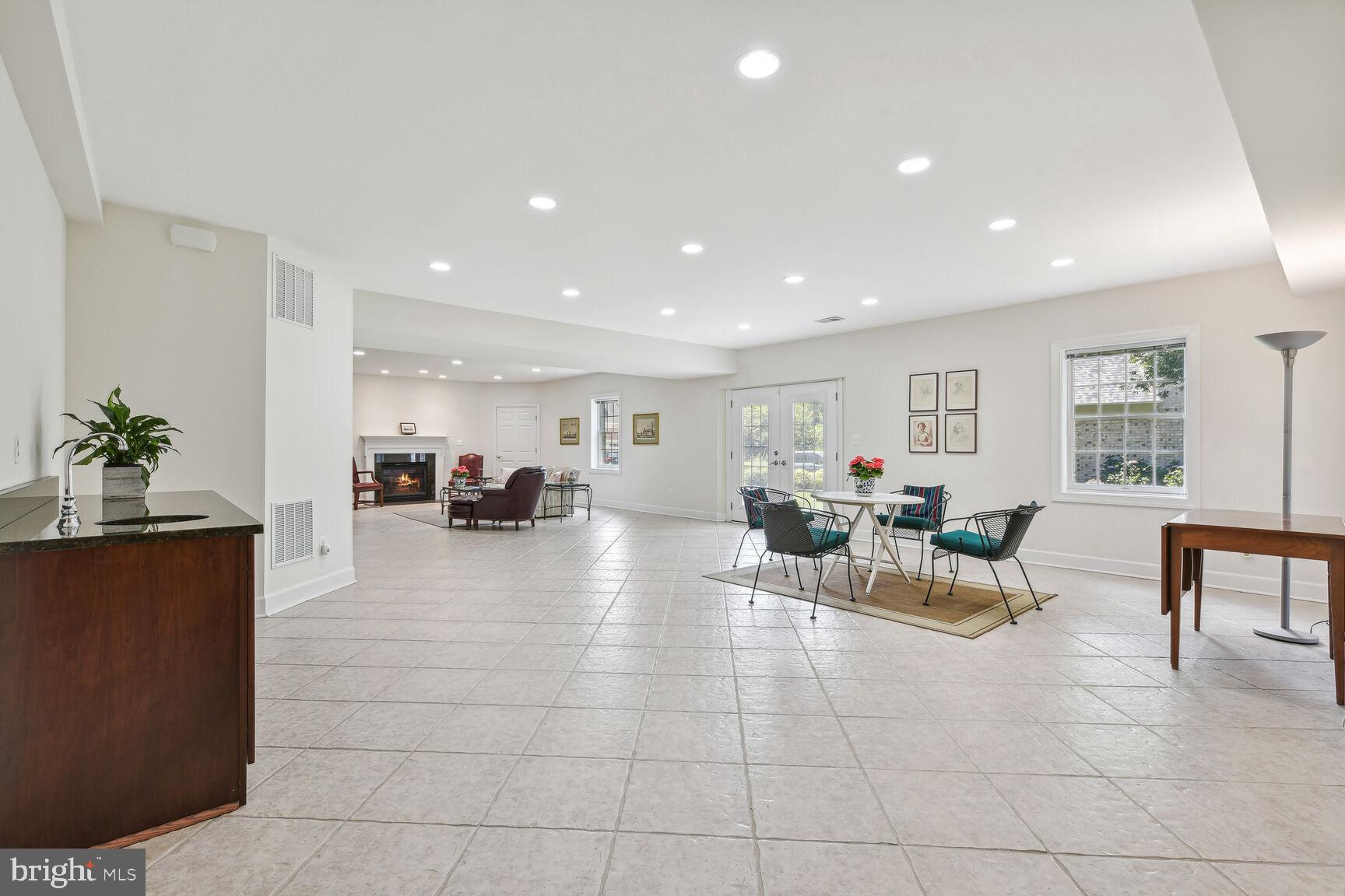 1906 Gables Lane Vienna, VA 22182 - Photo 39 of 52 Lowe Level with Wet Bar and Fireplace