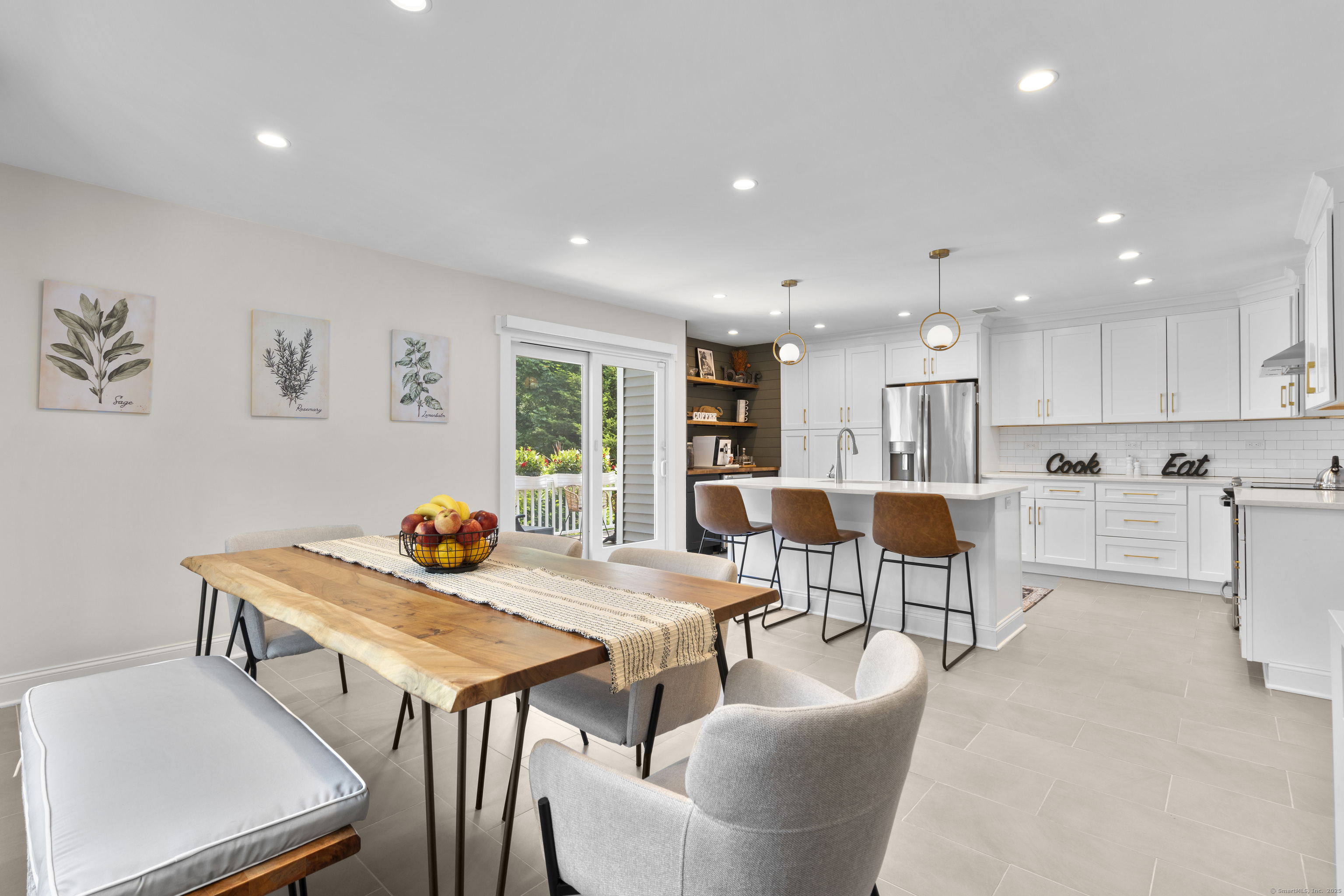 517 West Hill Road Stamford, CT 06902 - Photo 1 of 1 a living room with furniture and kitchen view