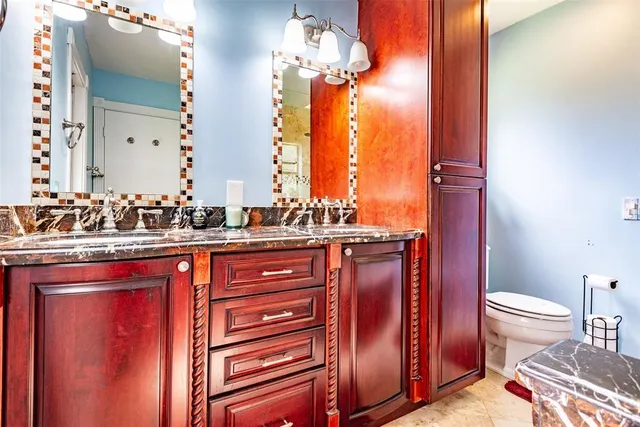 a bathroom with a bathtub and shower