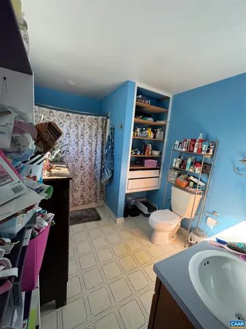 a view of a workspace with furniture