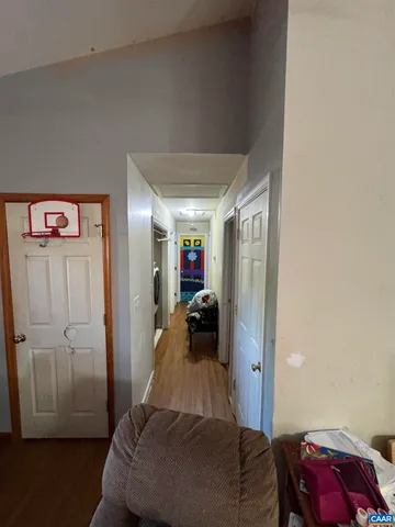 a bedroom with a bed and a walk in closet