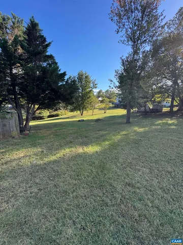 a view of a garden with an outdoor space