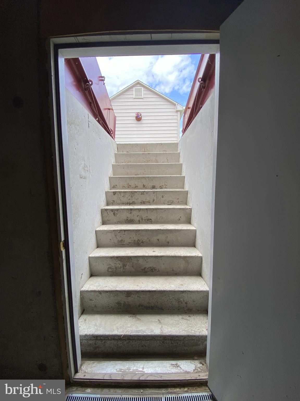 18 Doe Run Shillington, PA 19607 - Photo 44 of 56 Bilco walk out from basement to rear patio