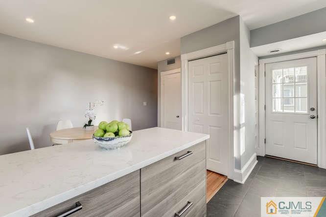37 Wiggins Street, Unit 2 Princeton, NJ 08540 - Photo 13 of 25 a bathroom with a sink a vanity and a potted plant