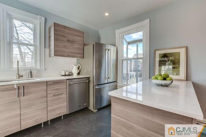37 Wiggins Street, Unit 2 Princeton, NJ 08540 - Photo 17 of 25 a kitchen with sink cabinets and window
