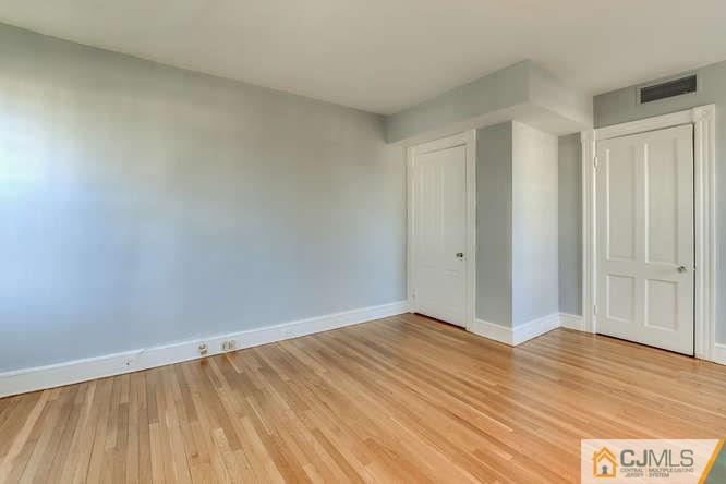 37 Wiggins Street, Unit 2 Princeton, NJ 08540 - Photo 21 of 25 a view of an empty room with wooden floor