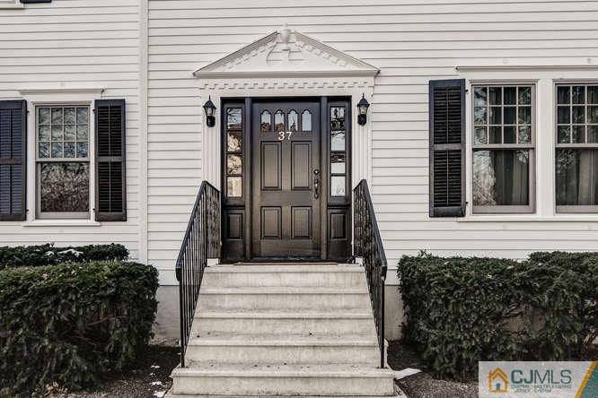 37 Wiggins Street, Unit 2 Princeton, NJ 08540 - Photo 4 of 25 a front view of a house with a garden