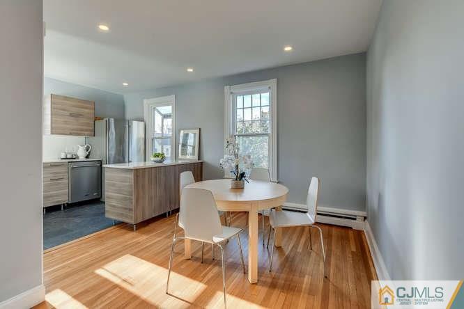 37 Wiggins Street, Unit 2 Princeton, NJ 08540 - Photo 10 of 25 a view of a dining room with furniture and wooden floor