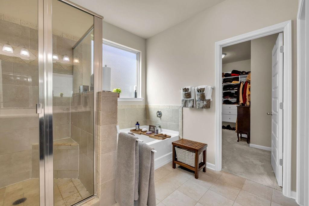 549 Harmony Way Locust Grove, GA 30248 - Photo 14 of 28 a bathroom with a shower