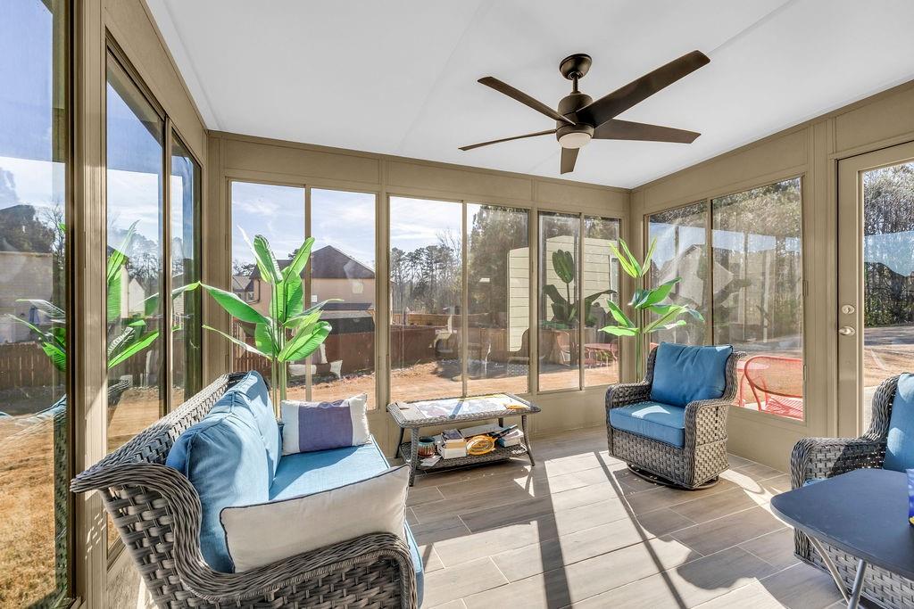 549 Harmony Way Locust Grove, GA 30248 - Photo 19 of 28 a living room with furniture and a large window
