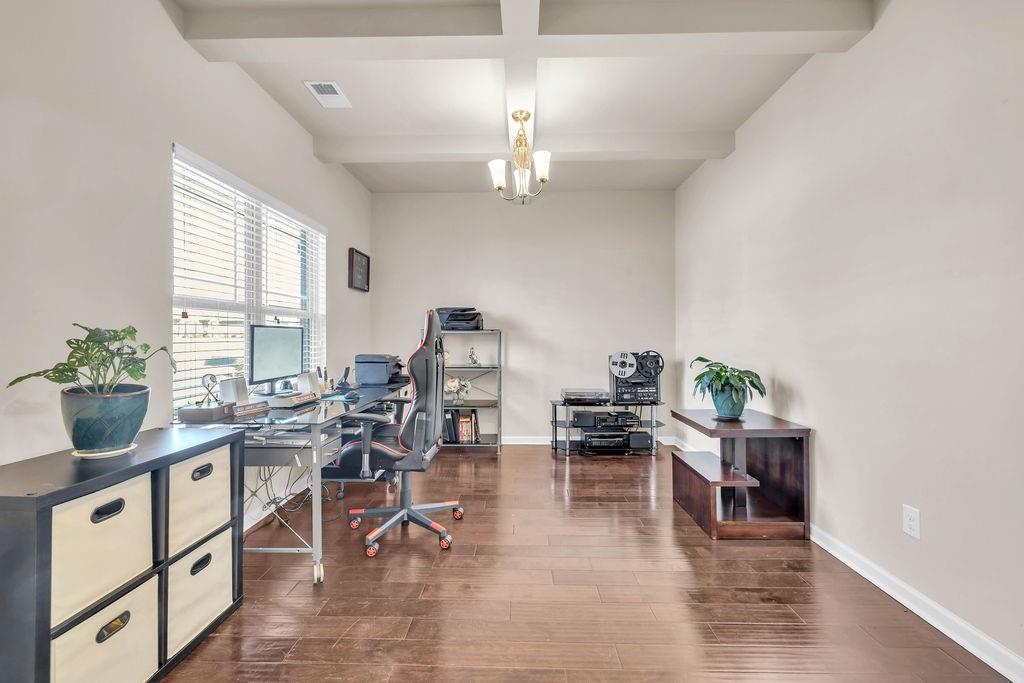 549 Harmony Way Locust Grove, GA 30248 - Photo 2 of 28 a view of a dining room with furniture window and outside view