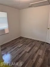 a view of a room that has a window