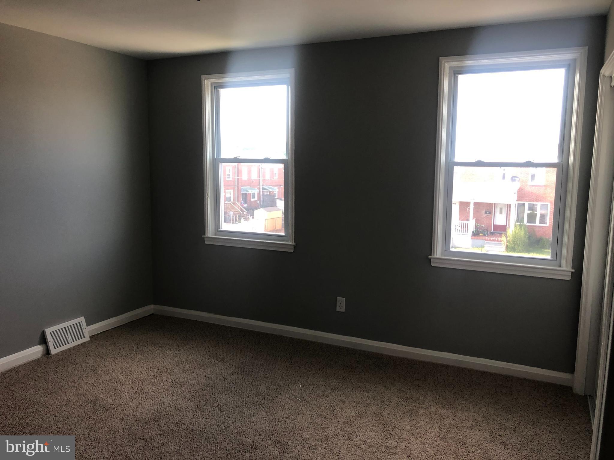 7441 Edsworth Road Baltimore, MD 21222 - Photo 33 of 37 an empty room with a window