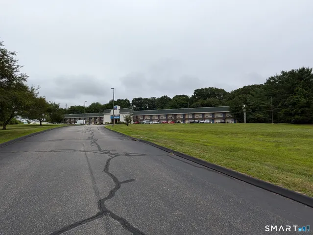 a view of a park with a slide