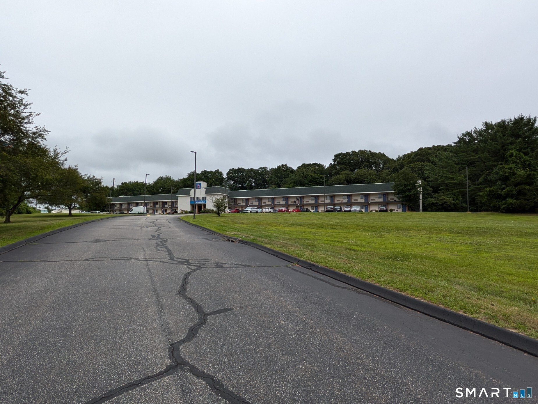 269 Flanders Road, Unit 1B East Lyme, CT 06357 - Photo 14 of 19 Motel 6 located north of Subject property