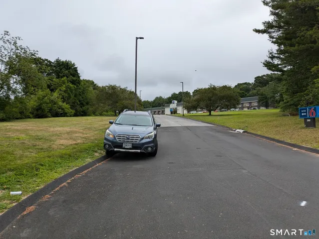 a view of swimming pool with outdoor space and seating area