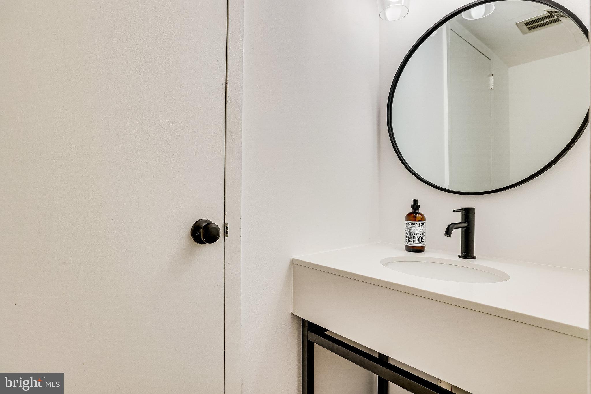1702 Ivy Oak Square Reston, VA 20190 - Photo 4 of 59 Main floor half bath