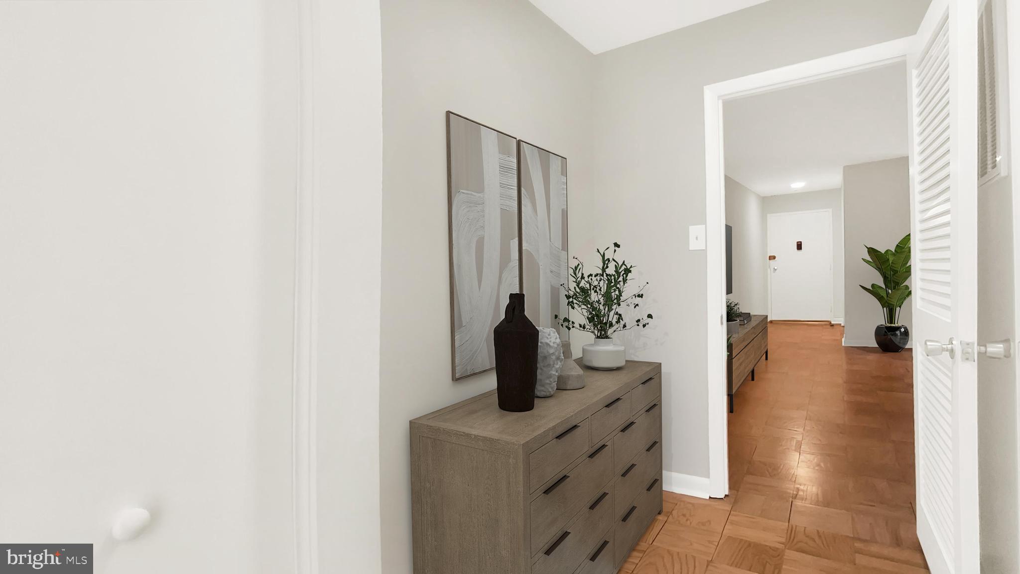10655 Montrose Avenue, Unit 103 Bethesda, MD 20814 - Photo 11 of 26 a dining room with furniture and wooden floor