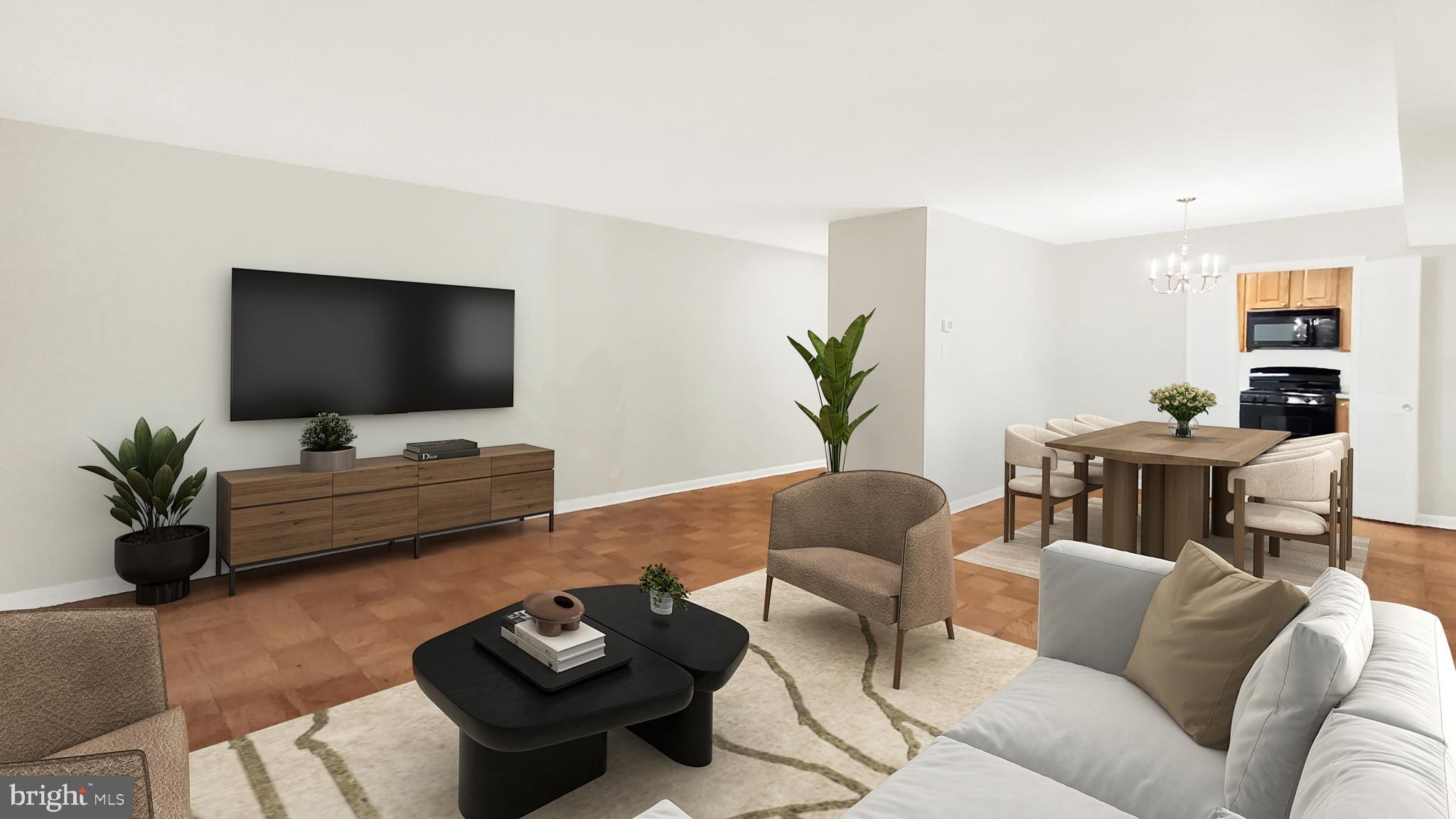 10655 Montrose Avenue, Unit 103 Bethesda, MD 20814 - Photo 6 of 26 a living room with furniture and a flat screen tv