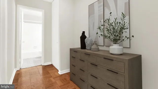 a view of bathroom with a potted plant on it