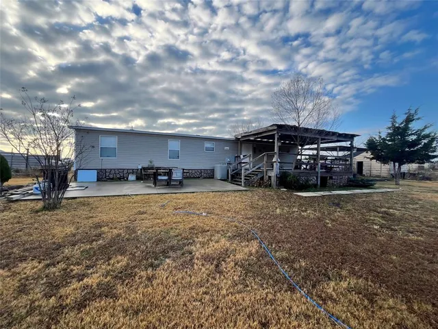 a car parked in front of a house