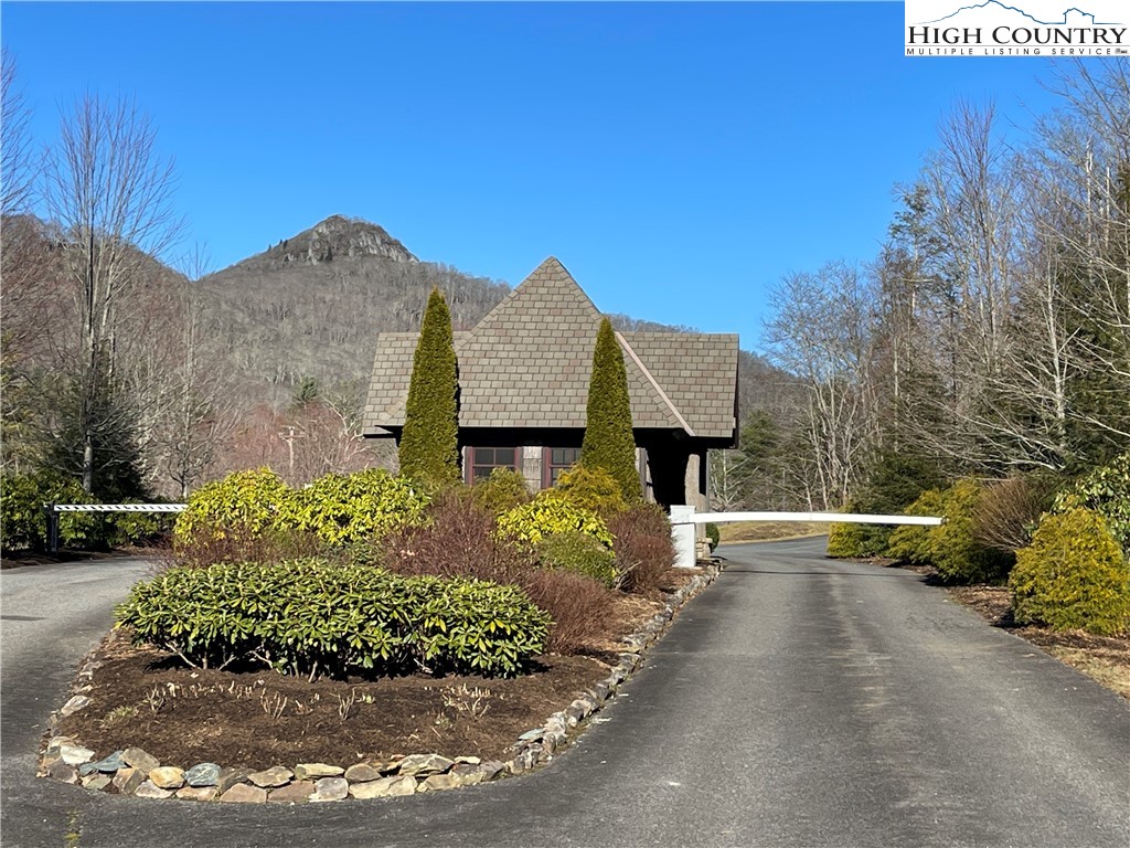 4-5 Trillium Lane Linville, NC 28646 - Photo 5 of 6 a view of a house with a yard and pathway
