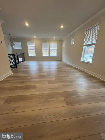 a view of livingroom and hardwood floor