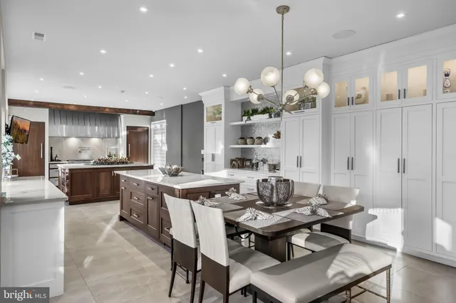 a kitchen with a stove a sink and a refrigerator