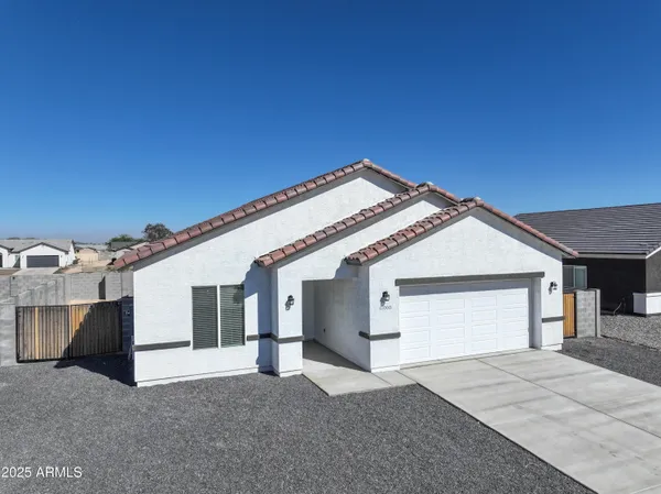 a view of a house with a garage