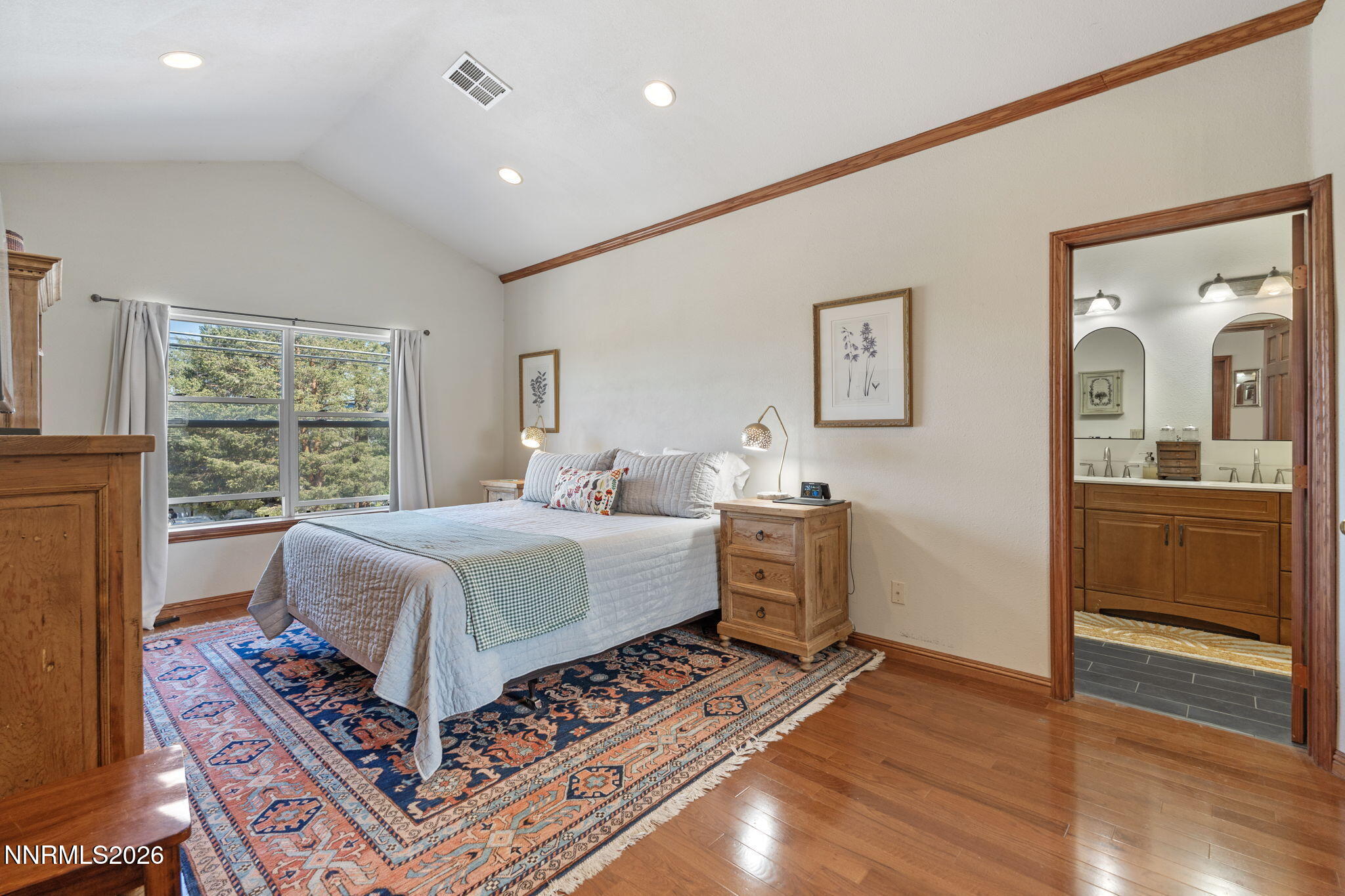300 Country Club Drive Reno, NV 89509 - Photo 28 of 48 a bedroom with a large bed and a window