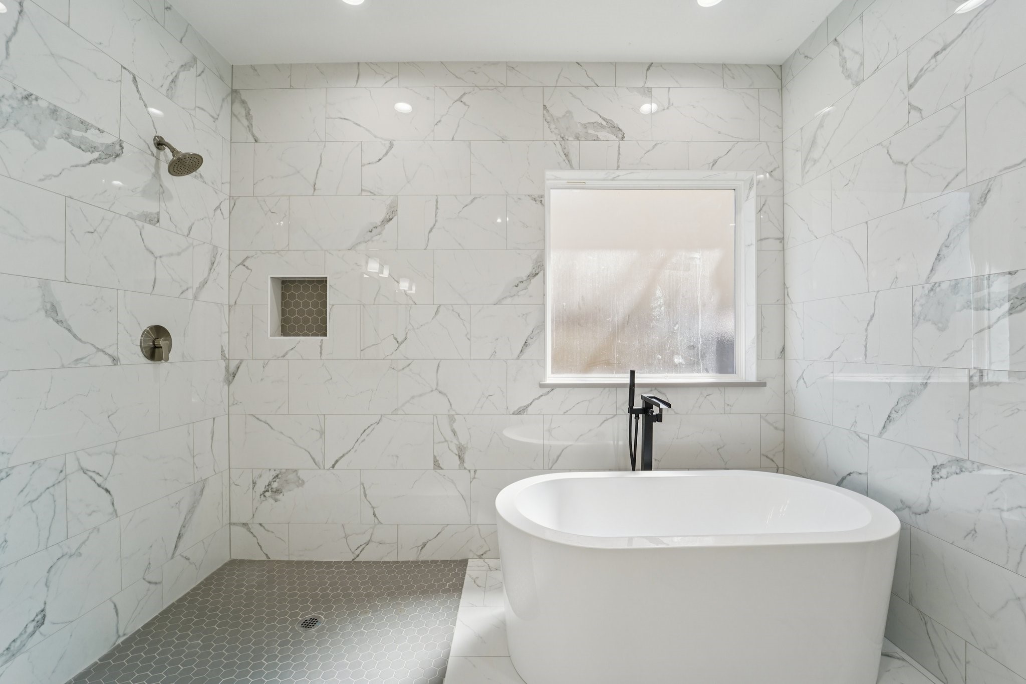 708 South Carroll Street La Porte, TX 77571 - Photo 17 of 29 a bathroom with a sink a toilet and shower