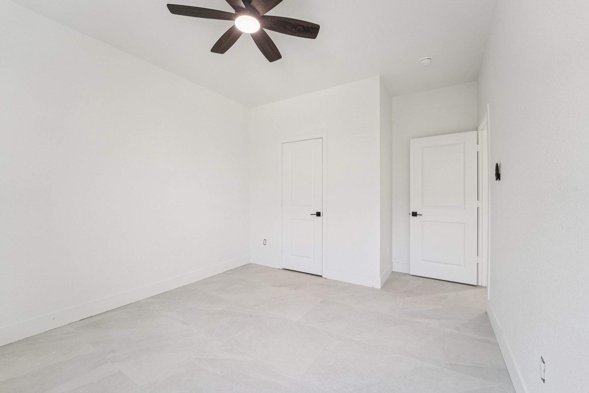 708 South Carroll Street La Porte, TX 77571 - Photo 23 of 29 an empty room with a window and a fan