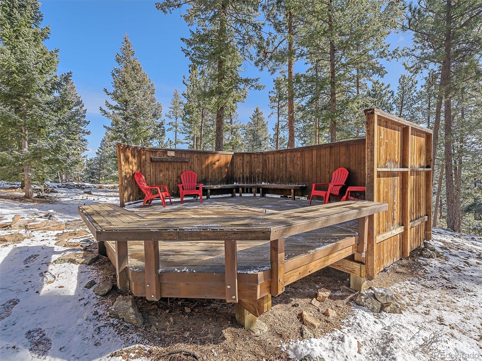 7990 Tim Tam Trail Evergreen, CO 80439 - Photo 38 of 45 a view of outdoor space with seating area