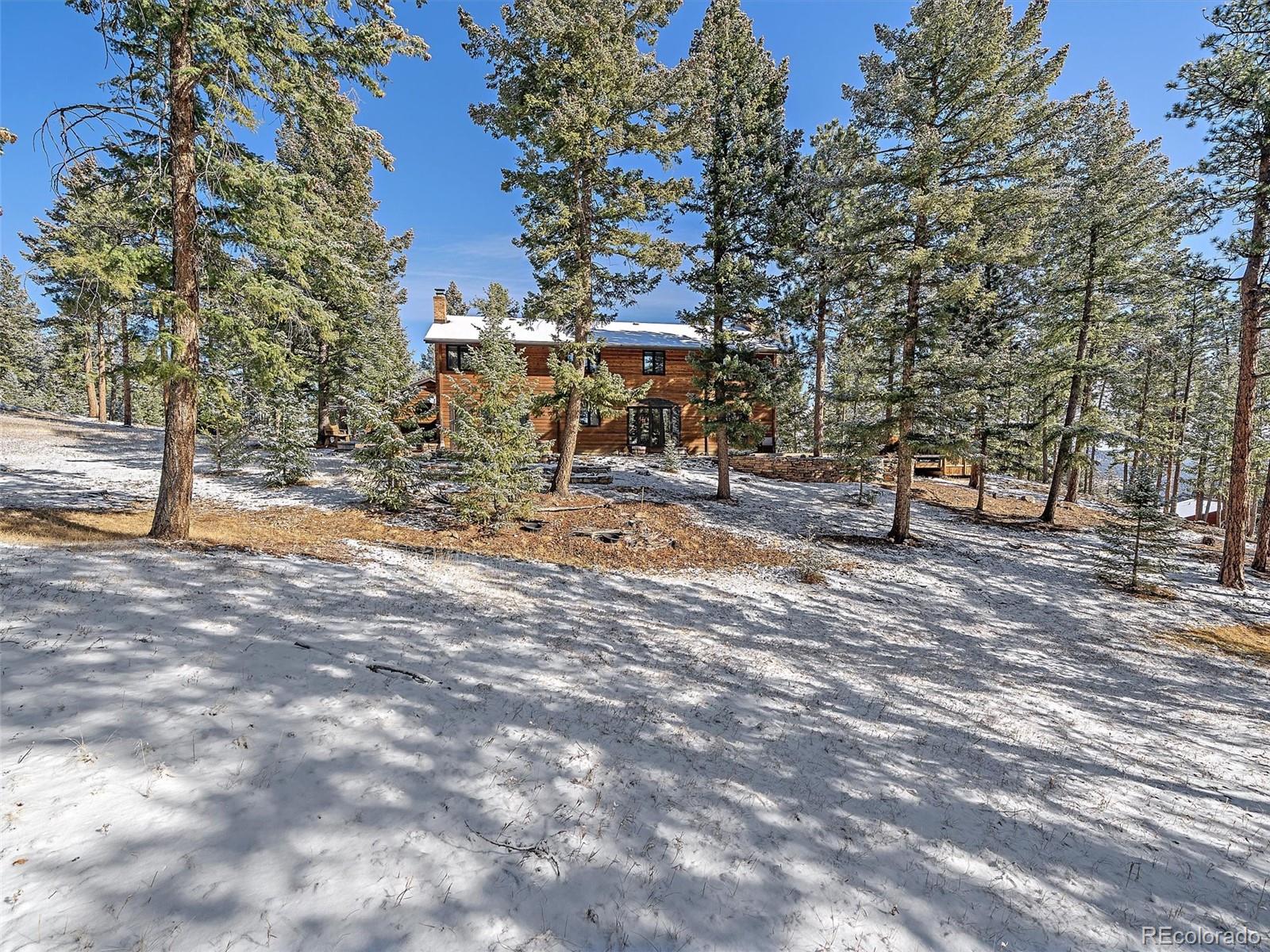 7990 Tim Tam Trail Evergreen, CO 80439 - Photo 41 of 45 a view of outdoor space with seating