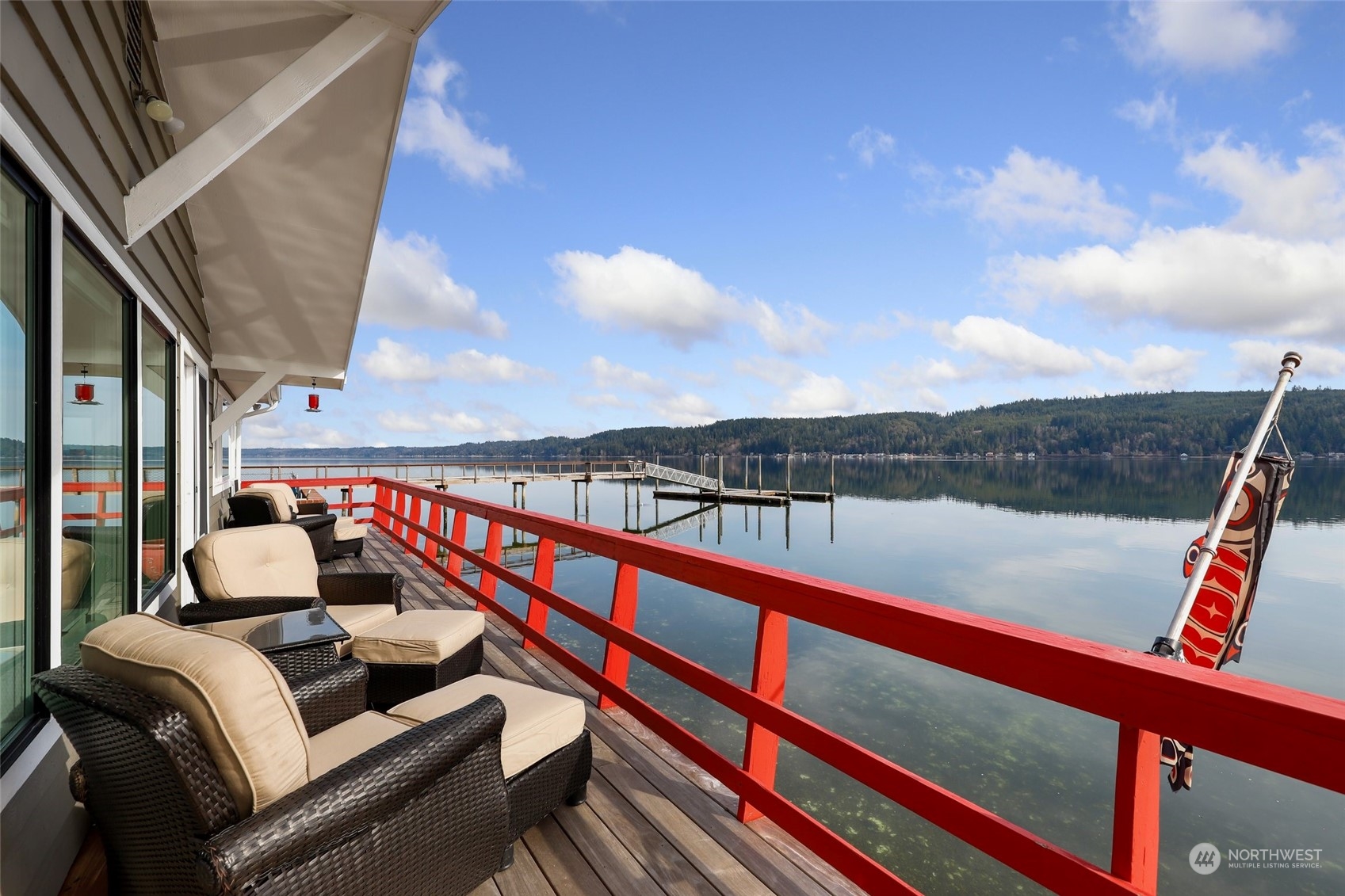 10351 Northeast North Shore Road Belfair, WA 98528 - Photo 8 of 40 a balcony with an outdoor seating