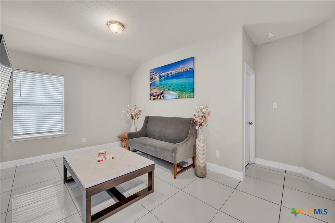 5577 Perdita Drive Belton, TX 76513 - Photo 17 of 25 a living room with furniture and next to a window