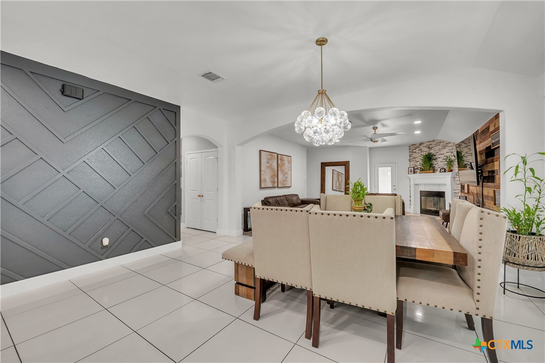 5577 Perdita Drive Belton, TX 76513 - Photo 10 of 25 a view of a dining room with furniture and chandelier