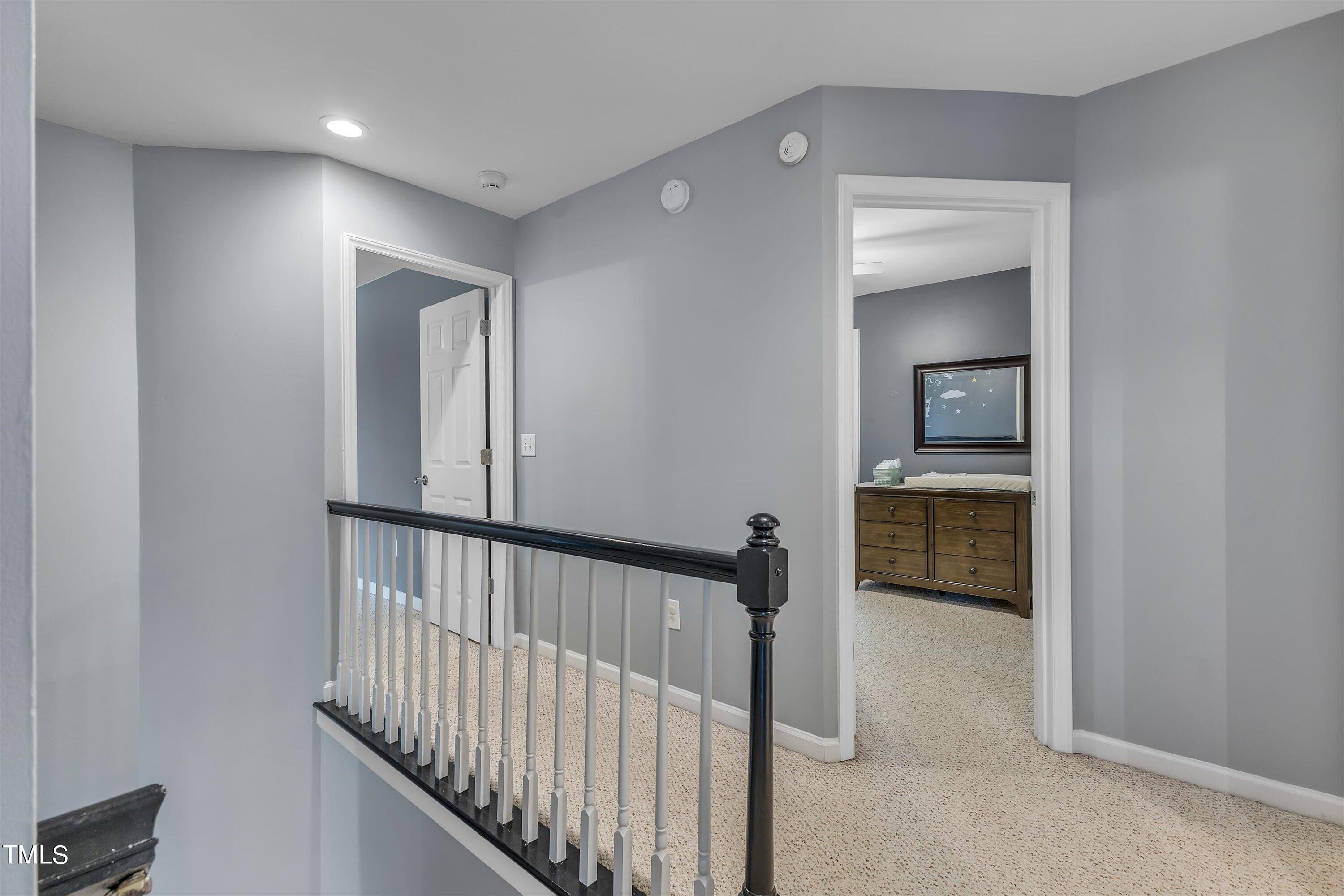 2424 Havershire Drive Raleigh, NC 27613 - Photo 31 of 52 a view of a hallway with a hallway