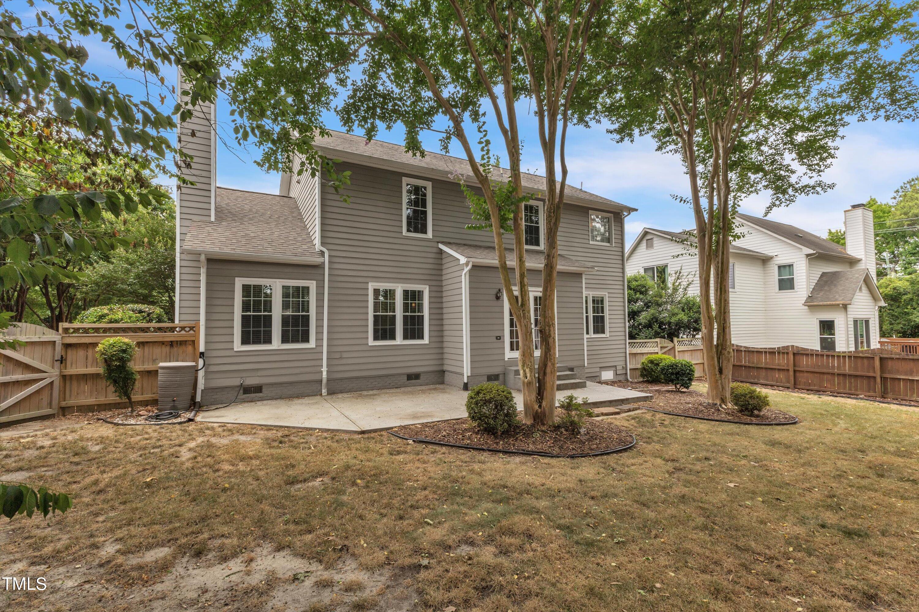 2424 Havershire Drive Raleigh, NC 27613 - Photo 49 of 52 a house with trees in front of it