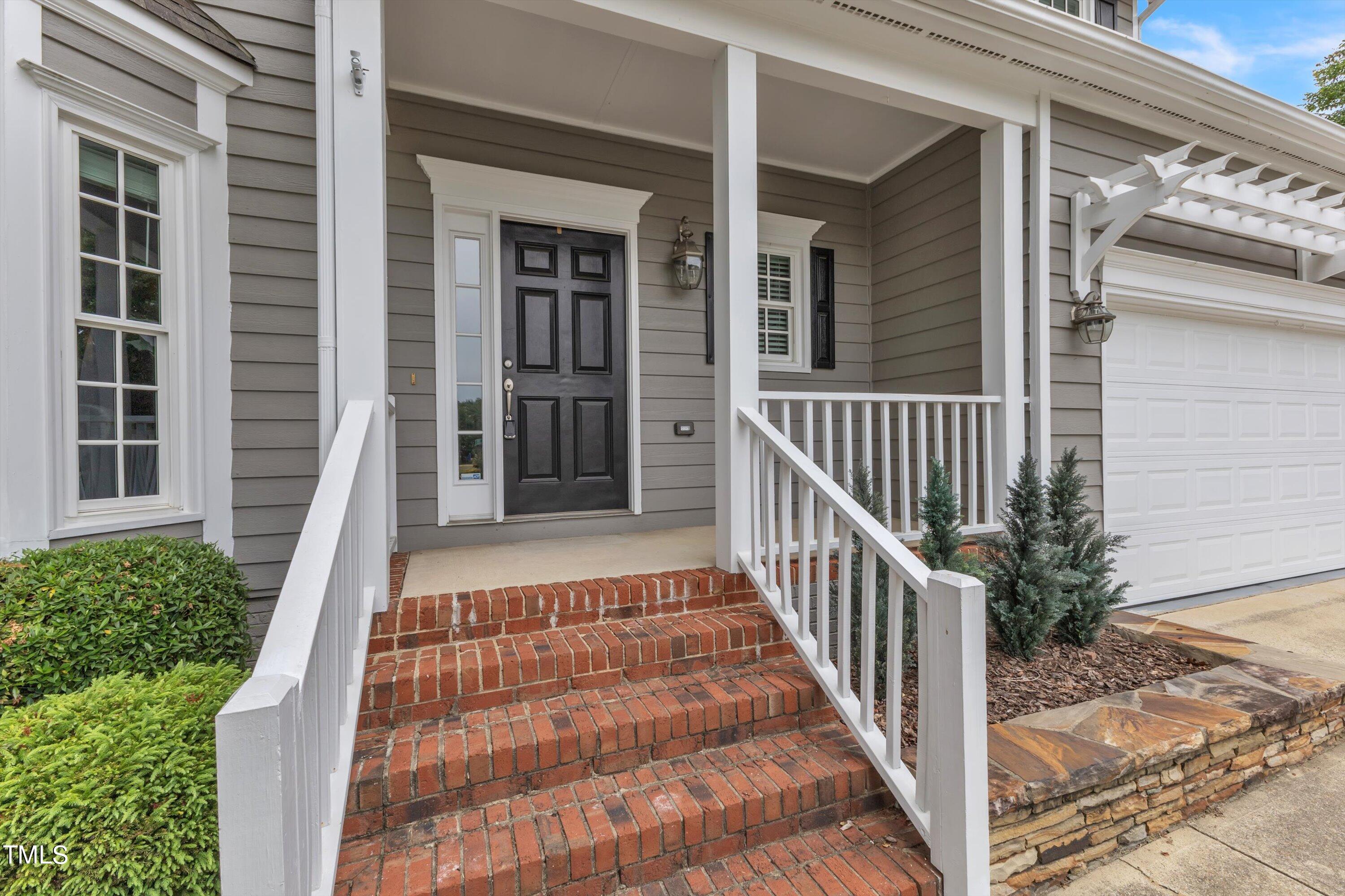 2424 Havershire Drive Raleigh, NC 27613 - Photo 5 of 52 a view of a balcony with door