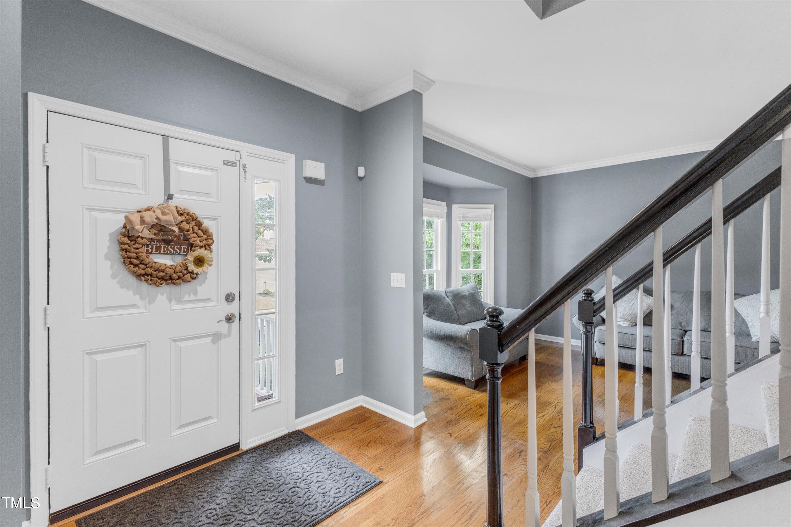 2424 Havershire Drive Raleigh, NC 27613 - Photo 7 of 52 a view of an entryway with wooden floor