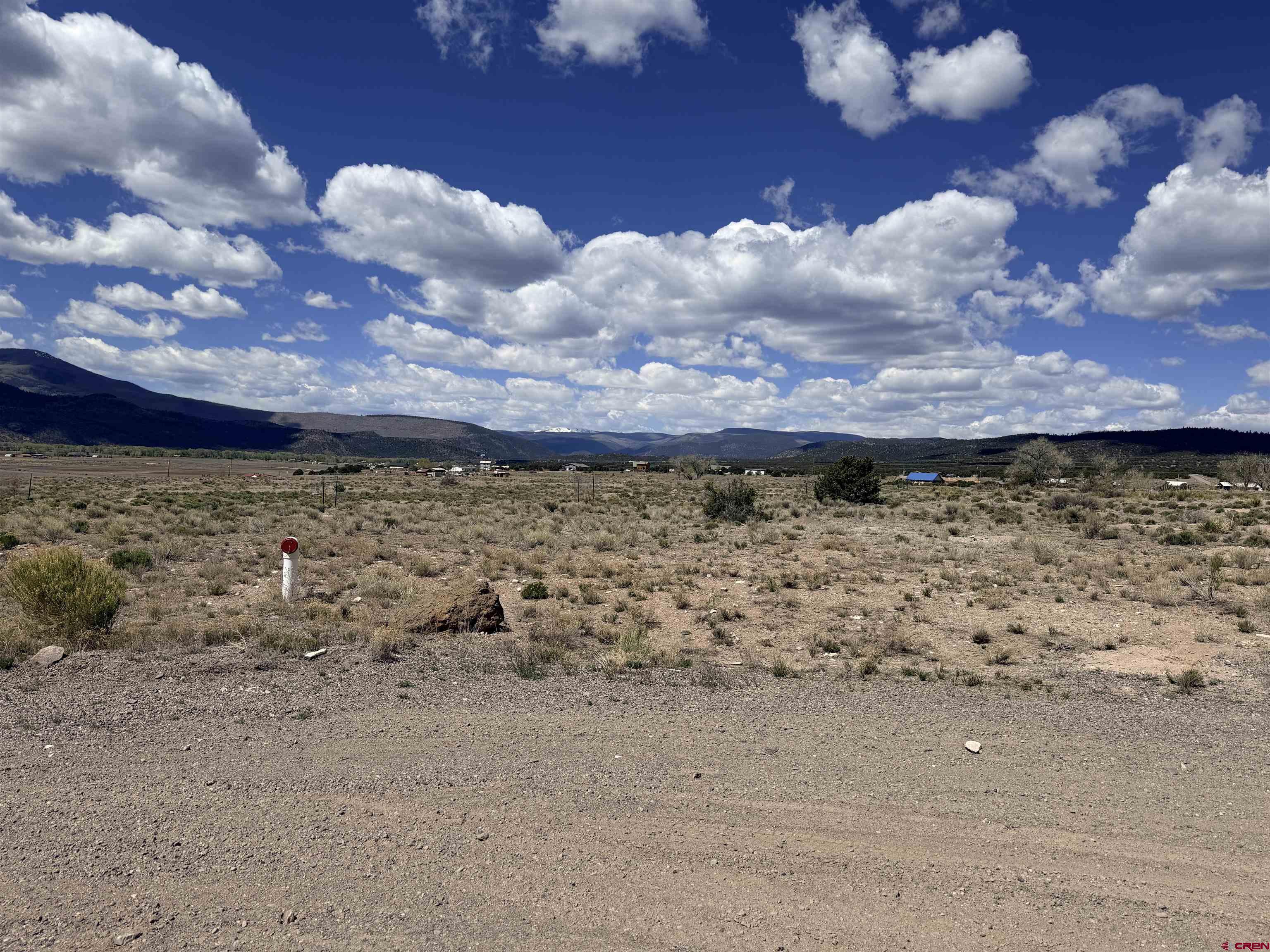396 Frontier Way South Fork, CO 81154 - Photo 2 of 27 a view of a yard with wooden fence