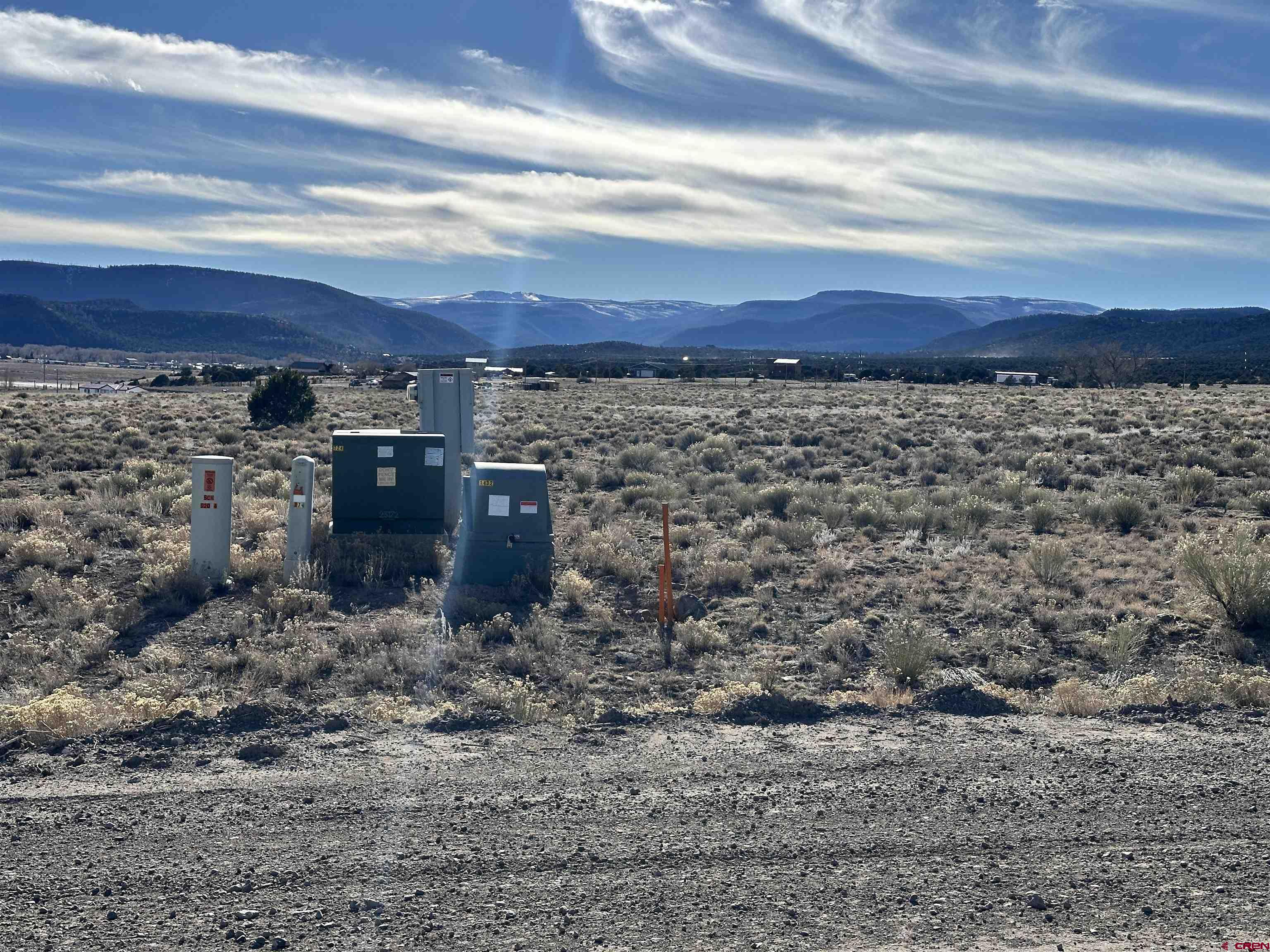 396 Frontier Way South Fork, CO 81154 - Photo 6 of 27 a view of a dry yard with large trees