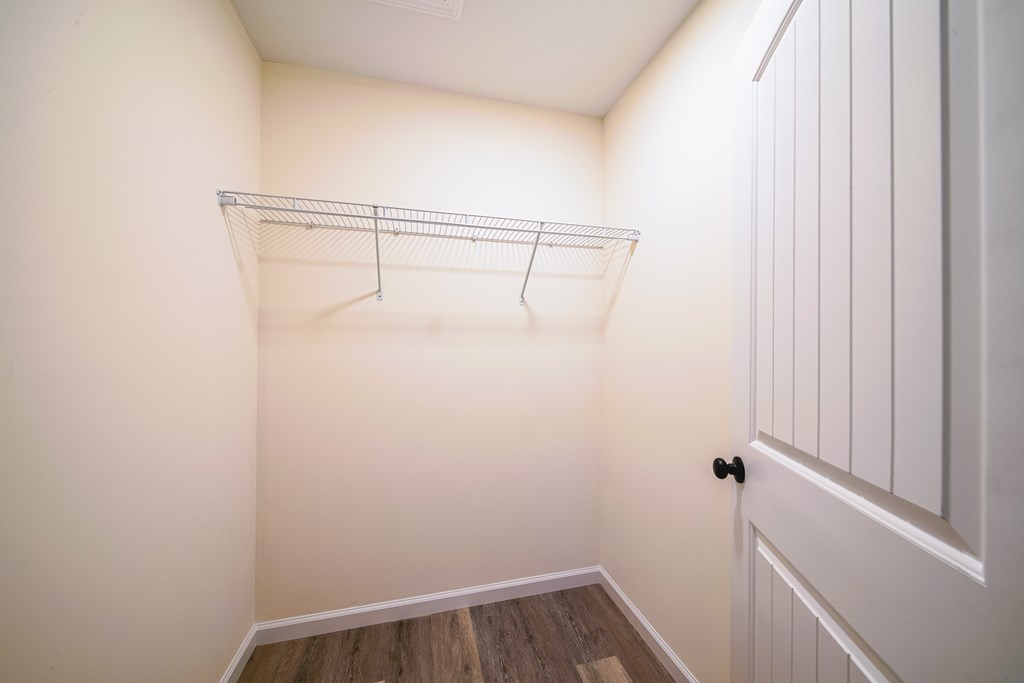 1050 Mt Airy Road Waverly Hall, GA 31831 - Photo 16 of 31 a view of a room with racks on the wall