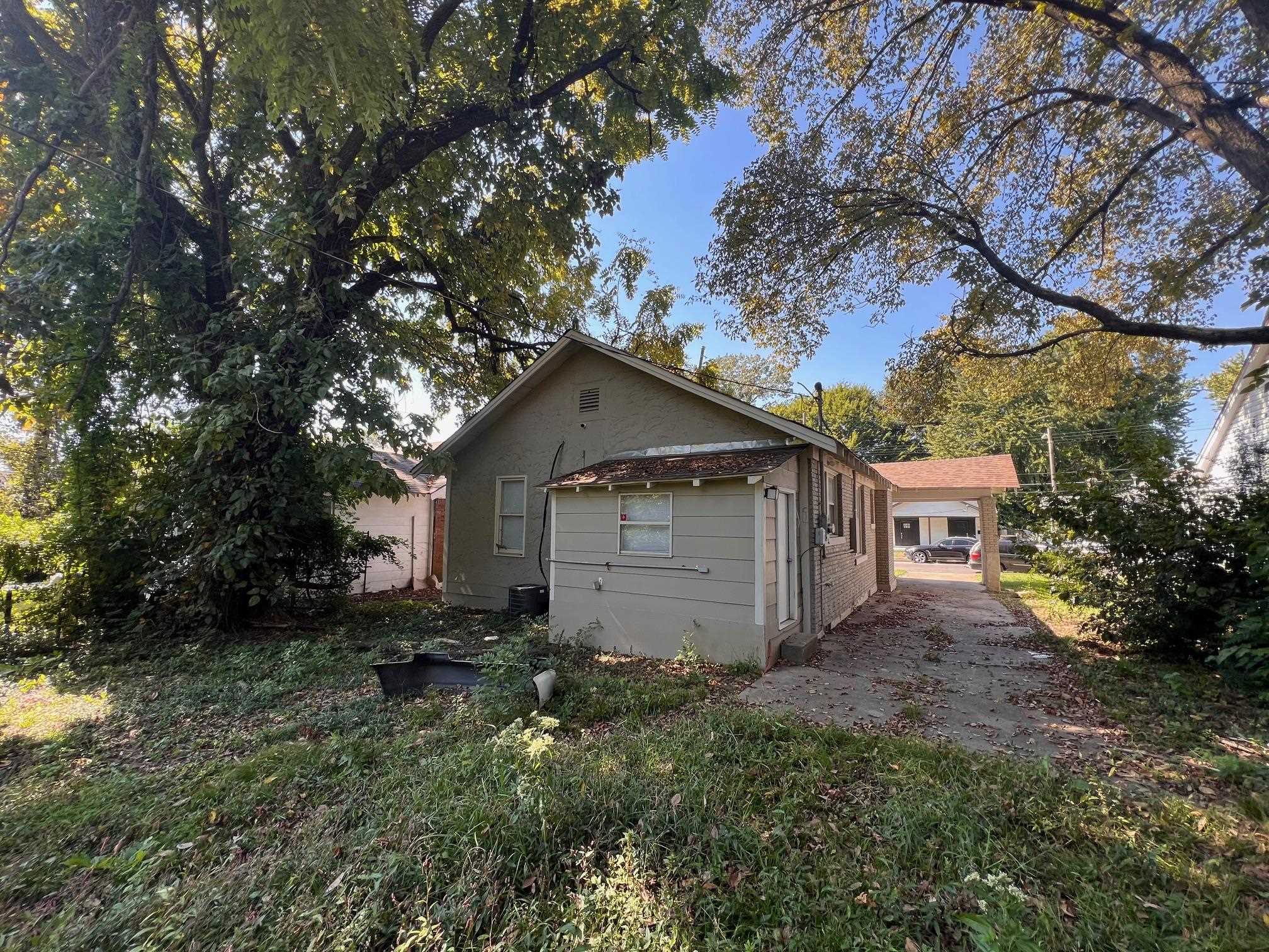 734 Spring Street Memphis, TN 38112 - Photo 2 of 13 a house view with a backyard space