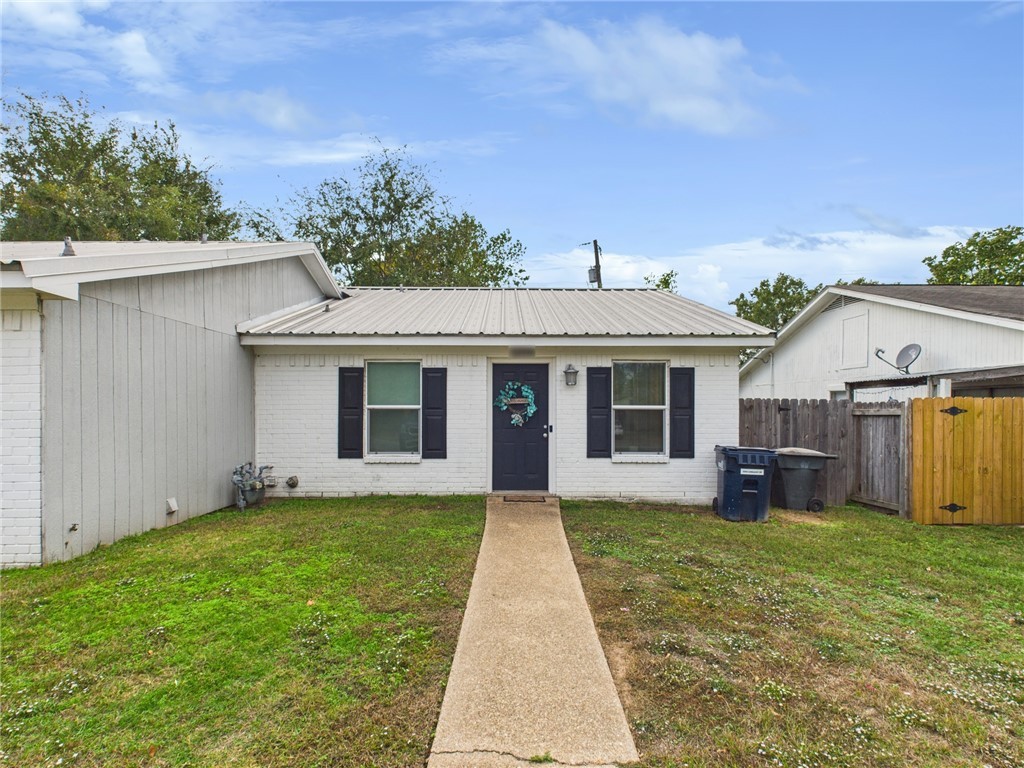 3304 Longleaf Circle College Station, TX 77845 - Photo 1 of 8 front view of a house with a yard