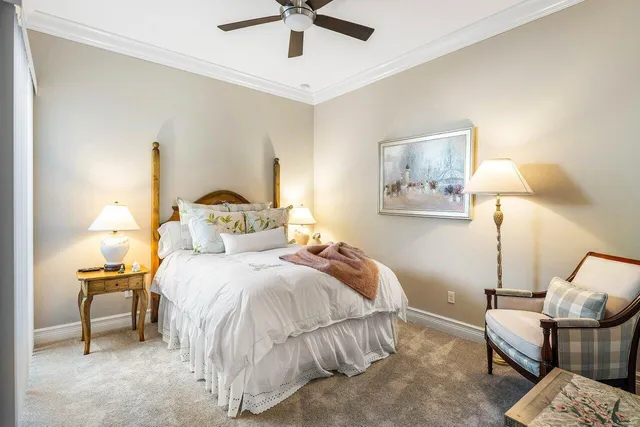 a bathroom with a granite countertop sink a toilet and bathtub