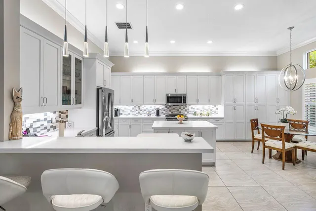 a bathroom with a toilet a sink and a mirror