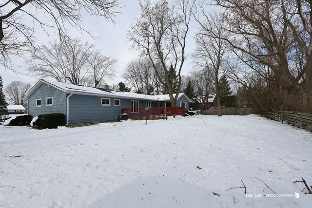 a view of a covered with snow in the yard